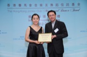 Mr Frank LEE, Chairman of The Hong Kong Jockey Club Music and Dance Fund, awarded a music scholarship to Miss Harmonic CHAU