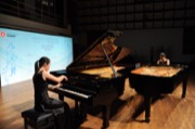 Piano duo performance by Miss Melodic CHAU and Miss Harmonic CHAU, recipients of music scholarships