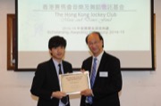 Dr PANG King-chee, MH, Chairman of The Hong Kong Jockey Club Music and Dance Fund awarded a music scholarship to Mr CHAN Ting-yuen